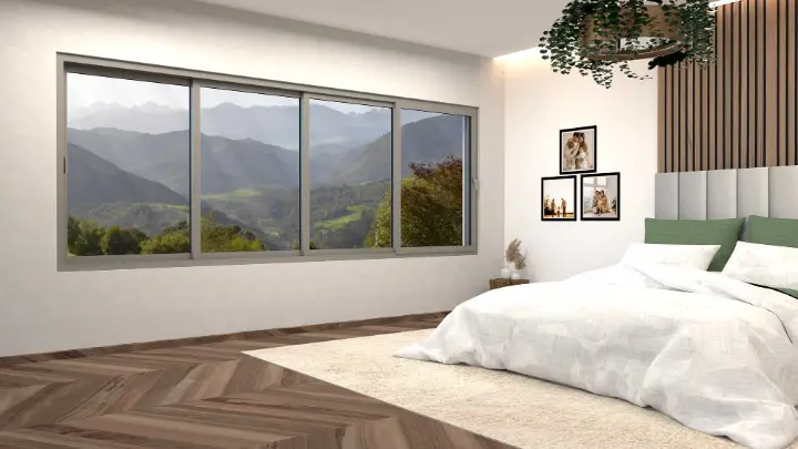 Dormitorio con gran corredera de aluminio C10 y vistas a la montaña